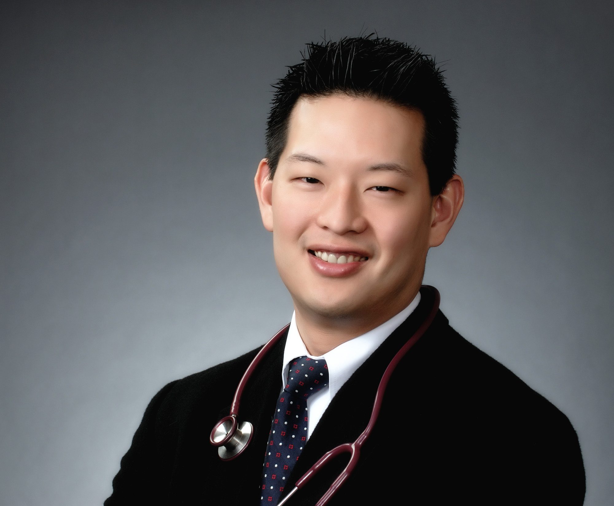 informal portrait of Asian physician